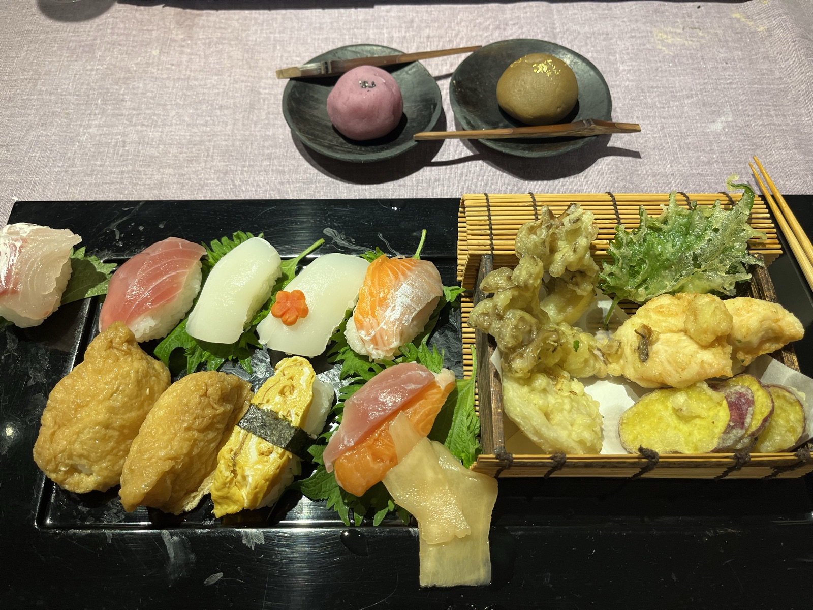 Learning to make it properly at a cooking class in Osaka — beginner's hands, very patient teacher
