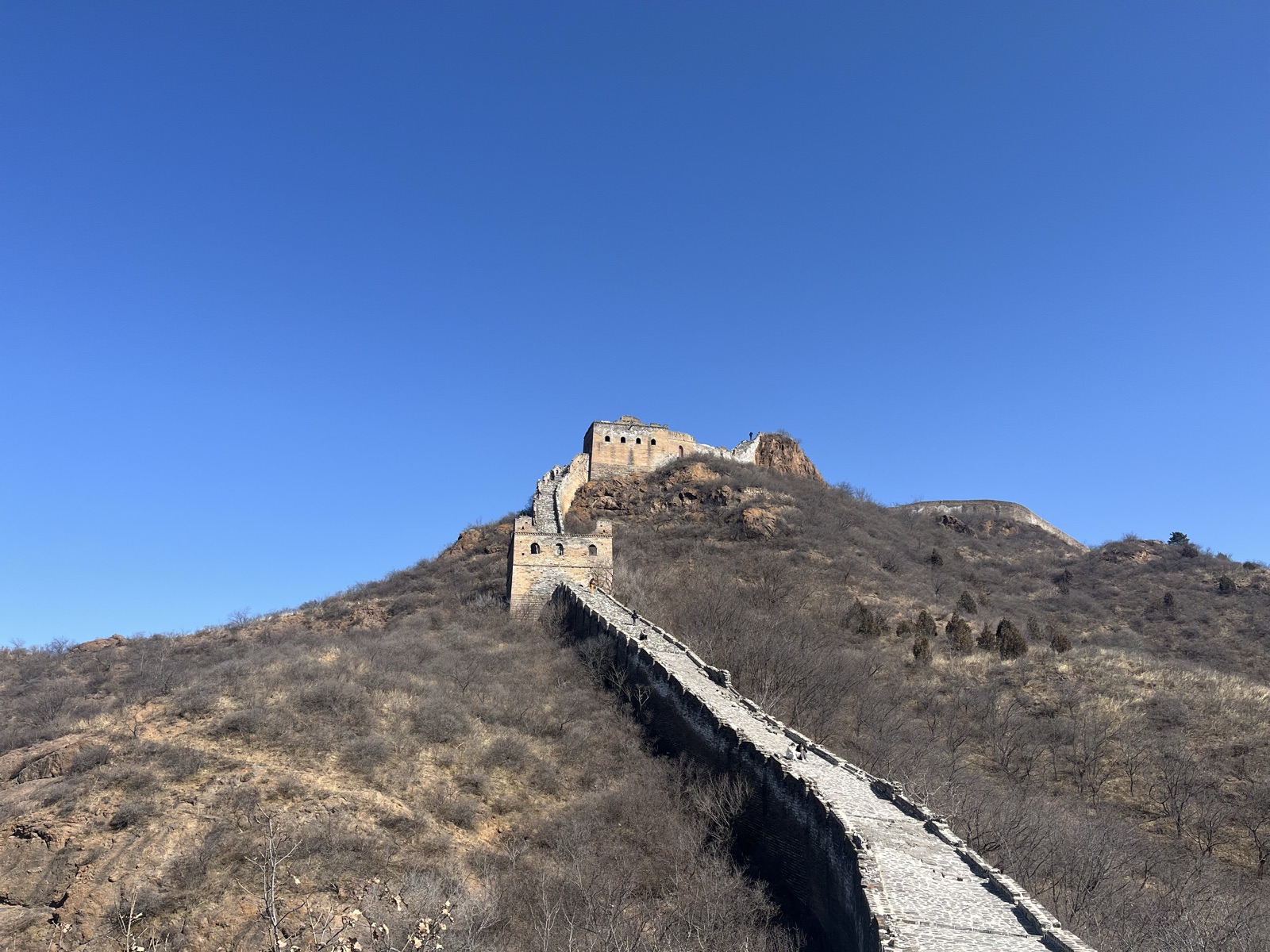 Climbing the wild Great Wall back home — a world wonder coiling over the ridges like a giant dragon